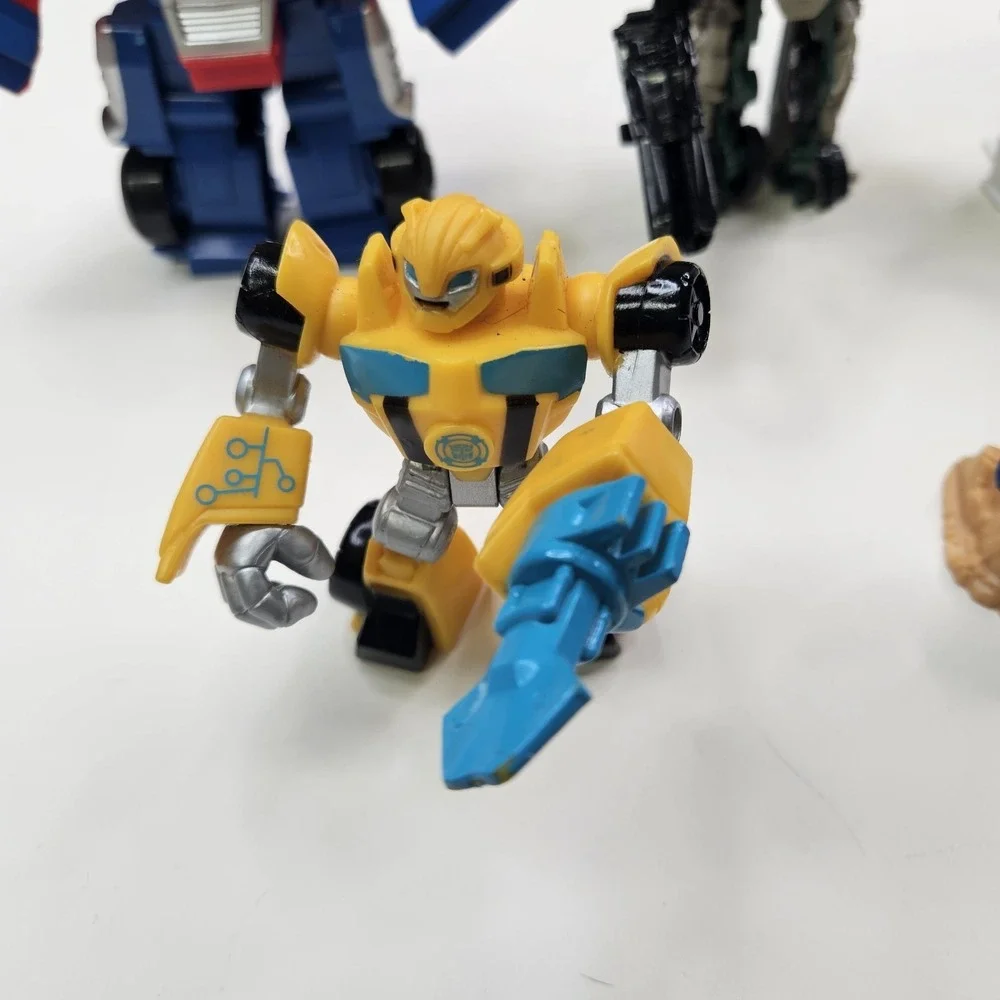 Lot of 5 Transformers Action Figures - Optimus Prime, Bumblebee & More